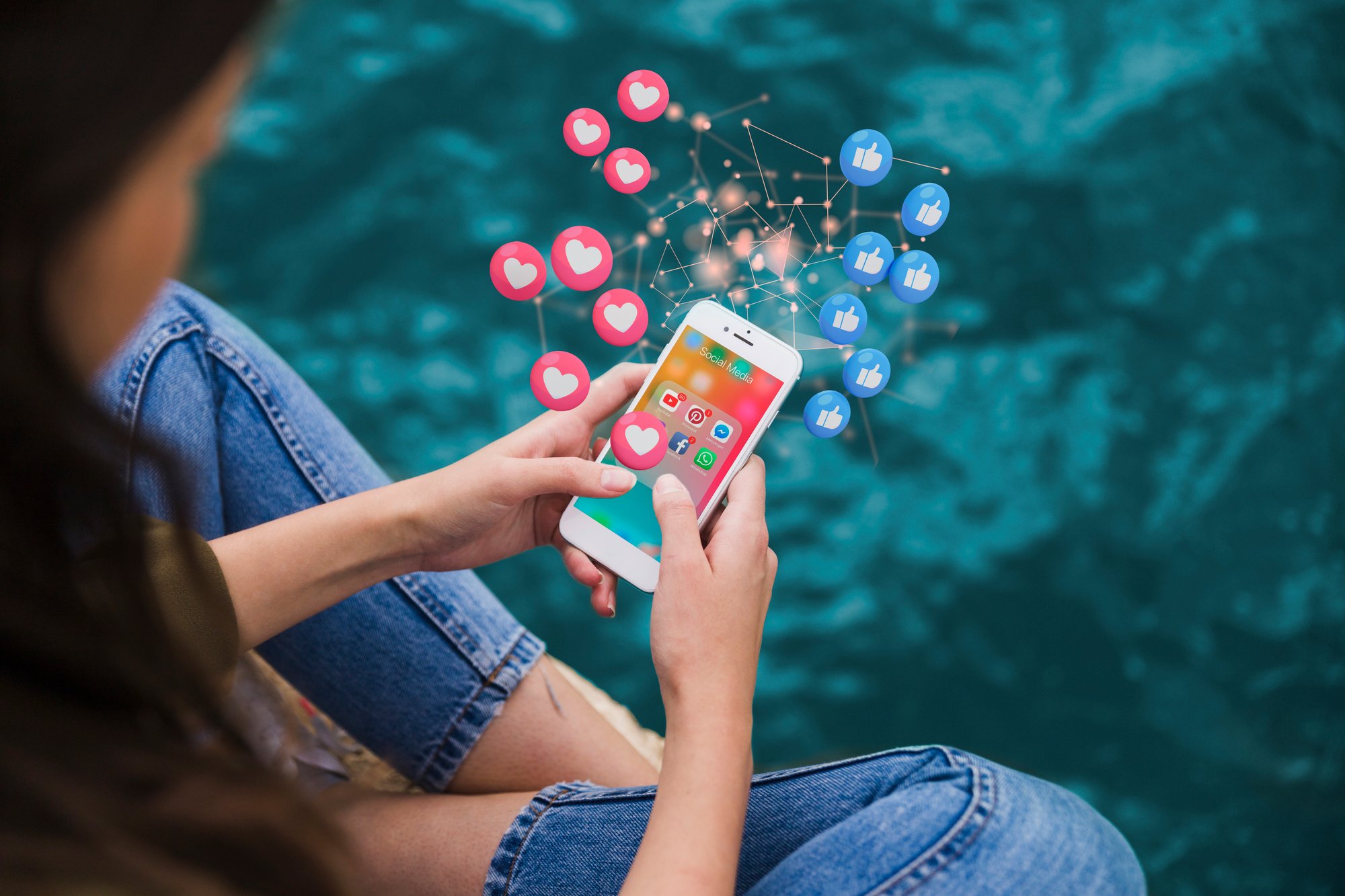 high-angle-woman-holding-smartphone