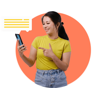 Smiling woman in yellow pointing at phone with chat bubble, representing expert support.